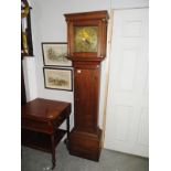 An oak long case clock with brass dial marked William Harris, Chippenham.