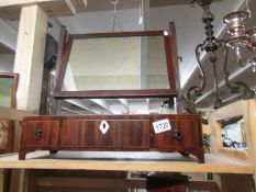 A Georgian dressing table mirror on a 3 drawer base.