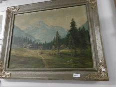 An oil on canvas Swiss mountain scene, image 78 x 59 cm.