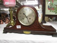 A presentation mantel clock dated 1928.