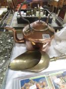 A Victorian copper coal scuttle and a brass corn scoop.