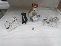 2 Victorian fairings, a Victorian dog with basket of puppies and another dog figure.