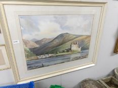 An framed and glazed watercolour entitled Eilean Donan and signed Fred Stott, 1972,