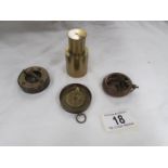 A Dolland of London brass compass, one other brass compass and one other item.