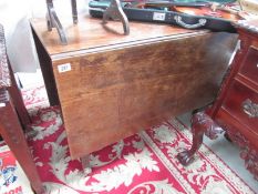 A mahogany drop side table.