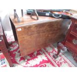 A mahogany drop side table.