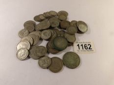 Approximately 19 ounces (466 grams) of pre 1947 silver coins.