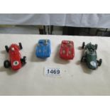 4 Scalextric type slot cars by Airfix and Marx.
