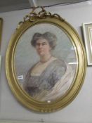 An oval gilt framed portrait of a lady entitled Bethia Clarke, image 70 x 53 cm.