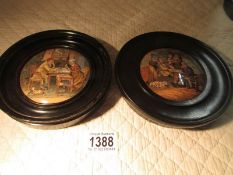 2 framed Victorian Pratt ware pot lids entitled 'A Fix' and 'A Pair'.