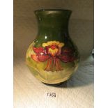 A large limited edition (66/200) green Moorcroft vase, dated 1983.