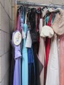 Approximately 18 bridesmaids dresses, evening gowns etc in various sizes.