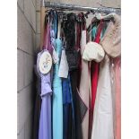 Approximately 18 bridesmaids dresses, evening gowns etc in various sizes.