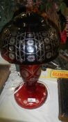 A good quality cut red glass Bohemian table lamp.