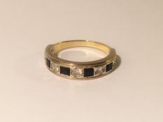 An eleven stone diamond and sapphire band ring, half hoop with half carat of diamonds, size R half.