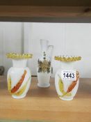 A pair of Stourbridge style glass vases and one other.