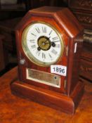 A mahogany cased mantel clock.