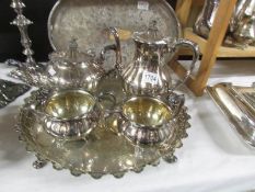 A 4 piece silver plate tea set on tray.