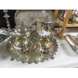 A 4 piece silver plate tea set on tray.