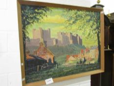 An oil on board entitled 'Bamburgh' of castle overlooking village, signed Donald Wall, 1974.