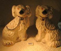 A pair of 20th century Staffordshire spaniels in good condition.