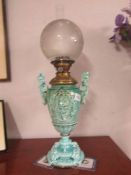 A Victorian oil lamp with turquoise base, (handles have been repaired).