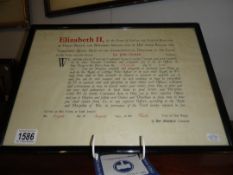 A framed and glazed good conduct award by Queen Elizabeth II for Ian John Canton.