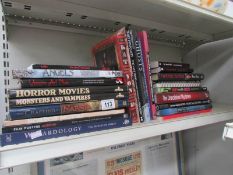 A large quantity of books relating to supernatural, horror movies, vampires, ghosts,