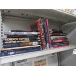 A large quantity of books relating to supernatural, horror movies, vampires, ghosts,