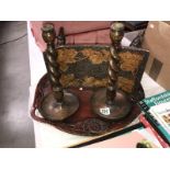 A carved wood tray, a poker work stool and a pair of barley twist candlesticks.