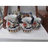 A set of 3 Losel ware Shanghai pattern graduated jugs.