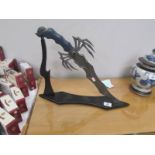 A decorative 'Fantasy' knife on stand.