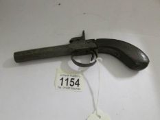 A 19th century pistol with removable barrel,.