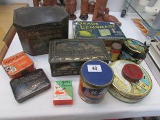 A mixed lot of old tins.