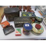 A mixed lot of old tins.