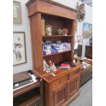 A stained pine dresser.