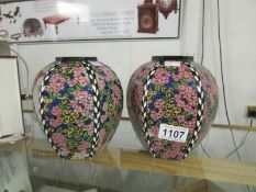 A pair of early 20th century Royal Doulton vases in Hydrangea pattern.