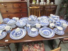 A large quantity of blue and white table ware.