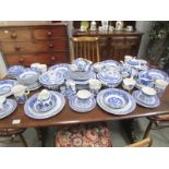 A large quantity of blue and white table ware.