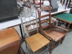 A 19th century ladder back chair and one other.