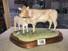 A Border Fine Arts 'Blonde D'Aquitaine' cow and calf.