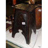 A carved wood stand inscribed to interior 'Kings Royal Rifles carved by A Dingle, The Royal Scots'.