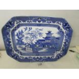 A blue and white willow pattern meat platter,