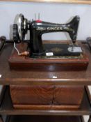 A cased Singer sewing machine