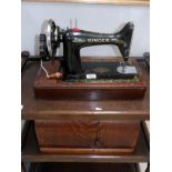 A cased Singer sewing machine