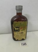 A bottle of White Horse Cellar Old Blend Scotch Whisky, Bottled 1948, No.284358. (damage to label).