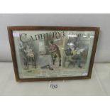 A framed and glazed Cadbury's cocoa advert.