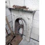 A cast iron mantle piece & back guard