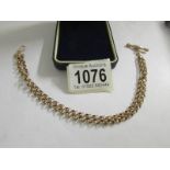 A 9ct gold ladies belcher watch chain with crab claw clasp and t bar, 7 grams.