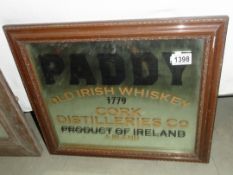 A Paddy Old Irish Whisky mirror.